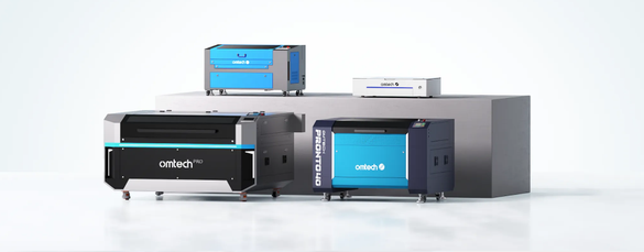 collection of omtech co2 laser engravers in a showroom