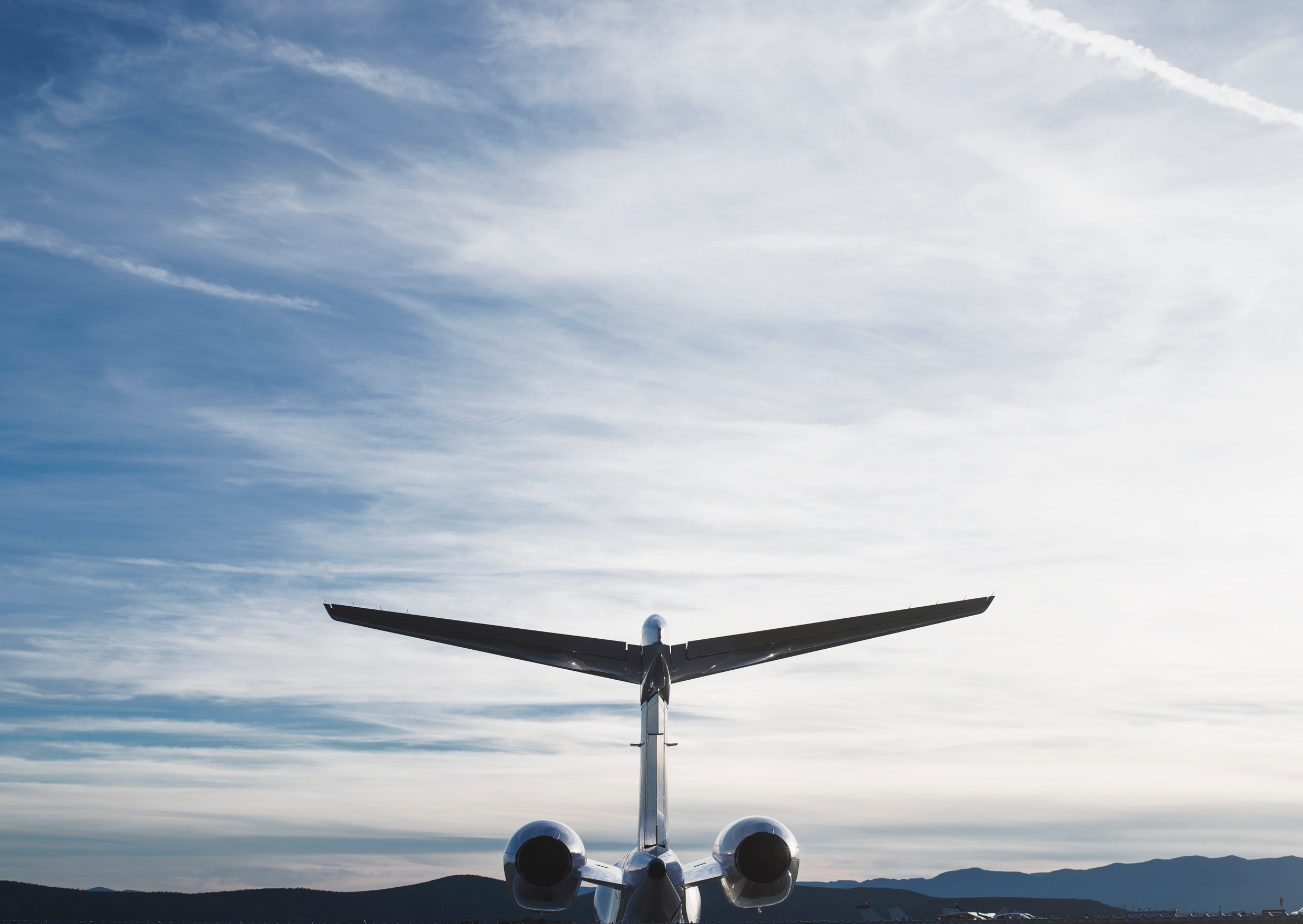 from_uk_jet-plane-tail-and-sky.jpg